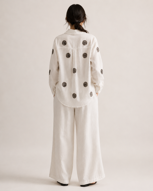 Opn Fold ivory cotton-linen shirt, back view with spiral embroidery detail